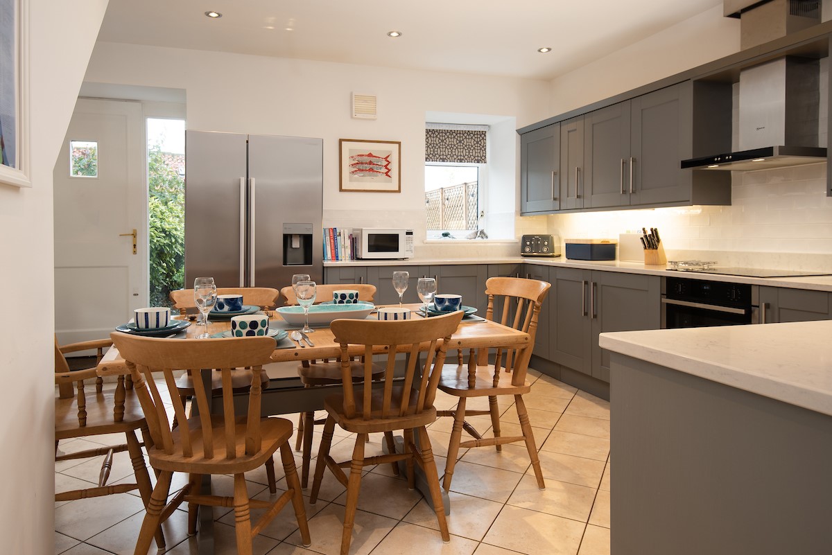 Samphire Barn - well-equipped kitchen with 4 ring hob, dishwasher, microwave and American-style fridge/freezer