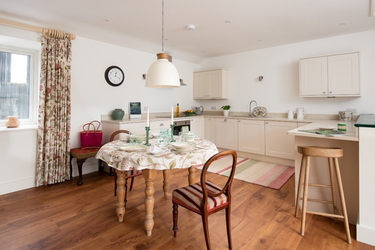 Swallow Dean - open-plan dining area and kitchen beyond with small breakfast bar