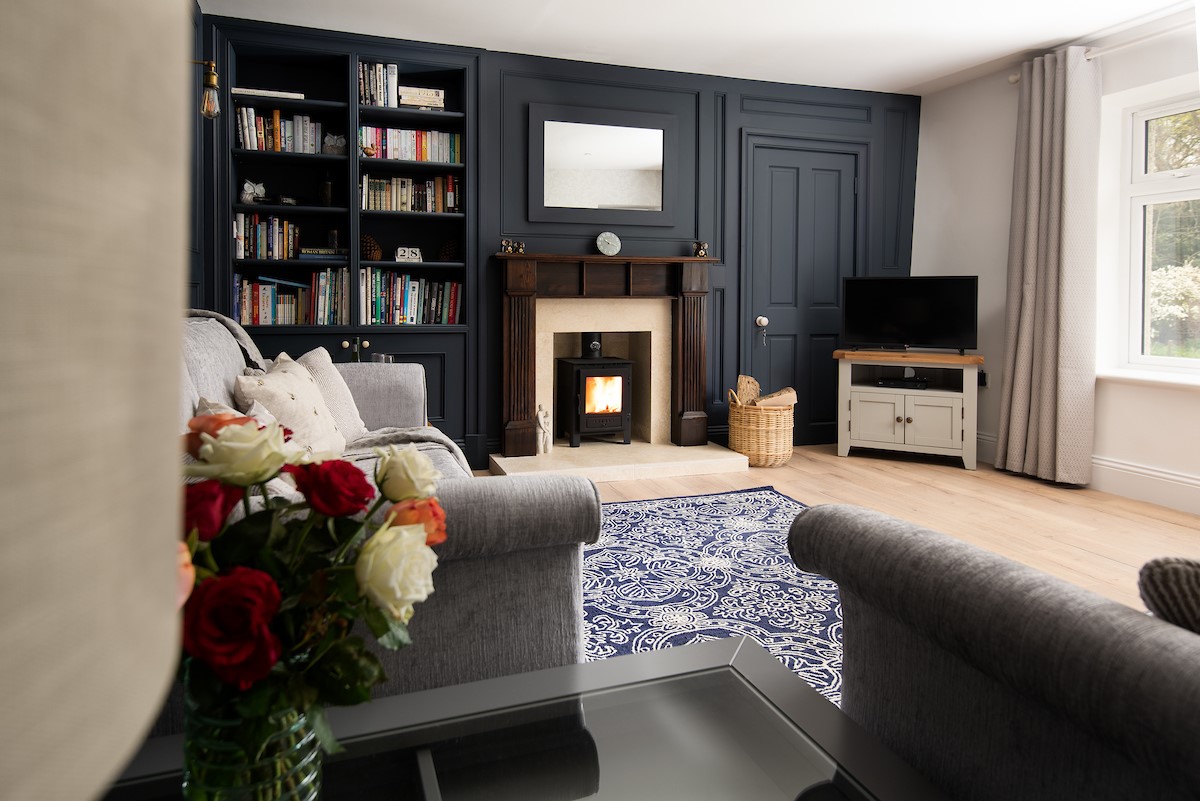 West Mill Cottage - choose from the wide selection of books and cuddle up in front of the cosy wood burner