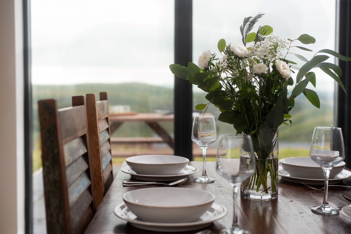 The Maple - enjoy meals around the dinning table with the Coquet valley as the backdrop