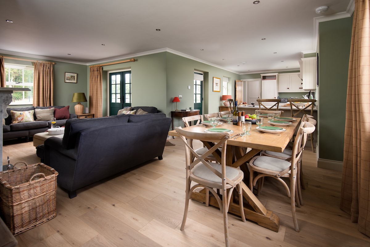 Risingham House - open-plan sitting room, kitchen and dining area