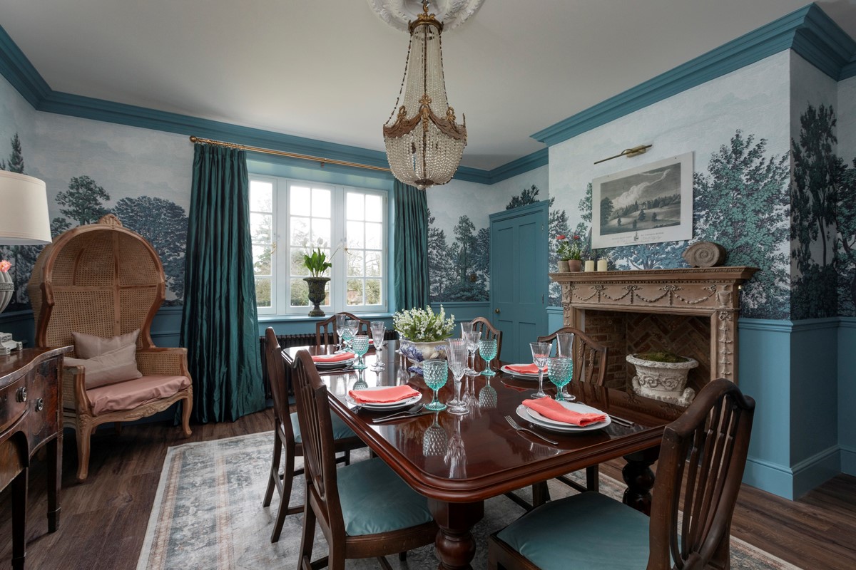 Gardener's Cottage, Twizell Estate - large dining room with dining table, decorative fireplace and porters chair