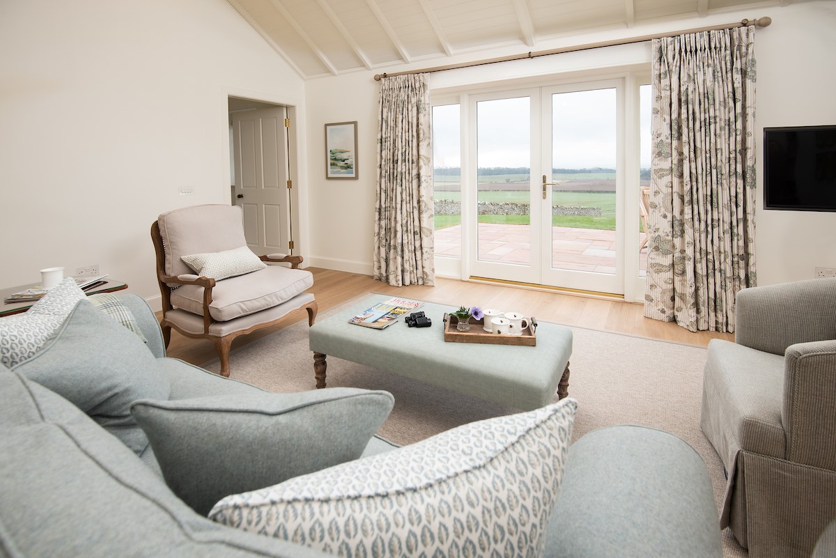 Hillside Cottage - sit back and enjoy wonderful panoramic views from the comfort of the sitting room