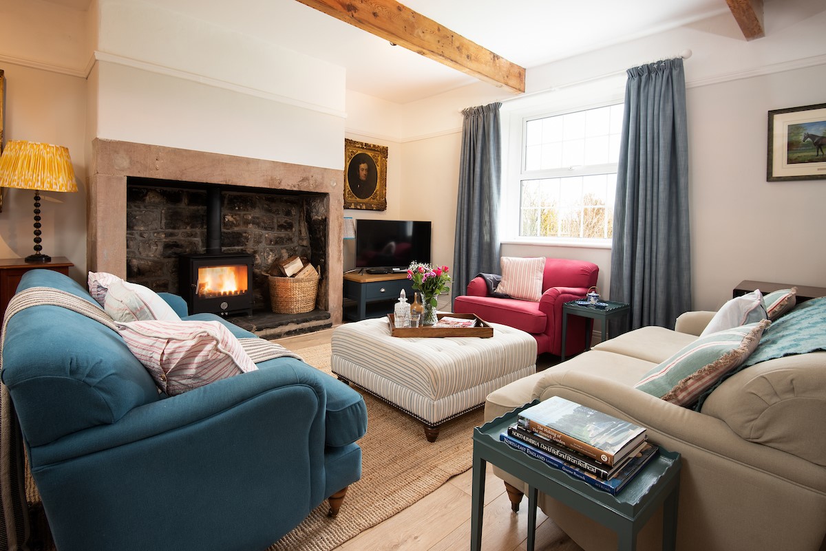 Appletree Cottage - with a cosy wood burning stove and soft linen sofas
