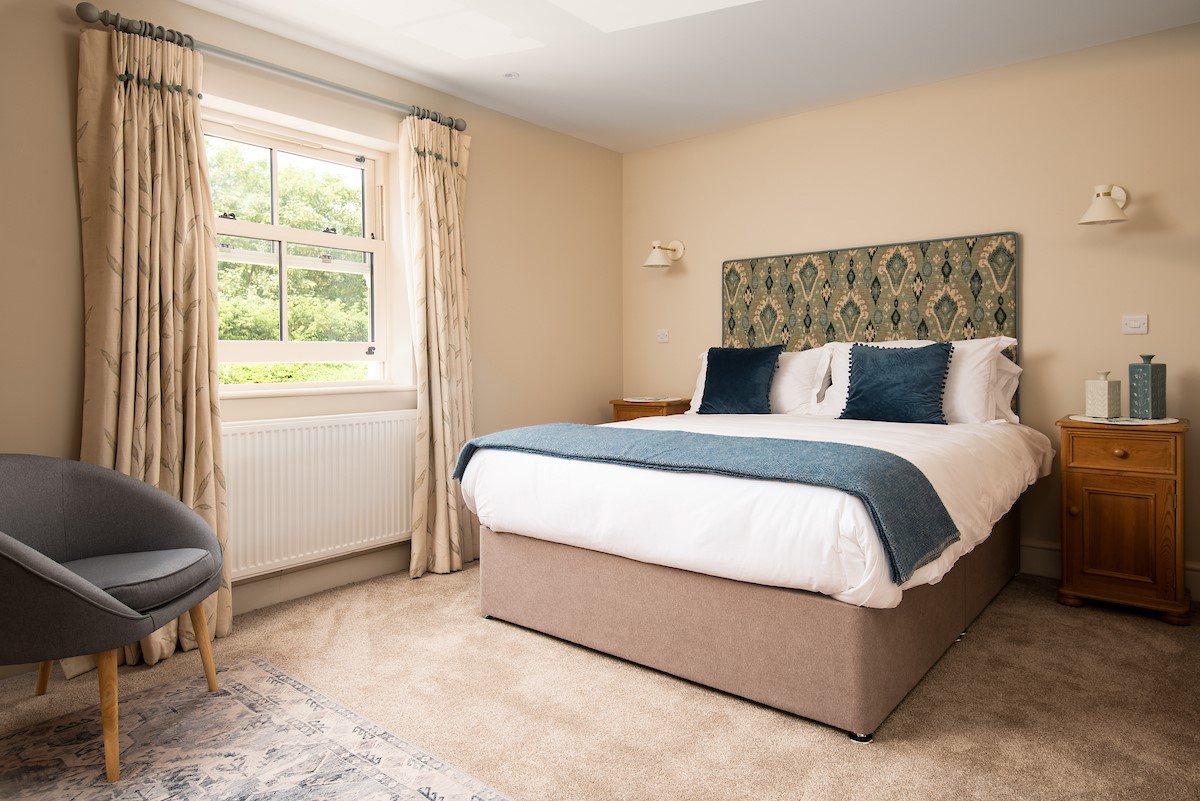 Partridge Lodge - bedroom with king size double bed and views to the front