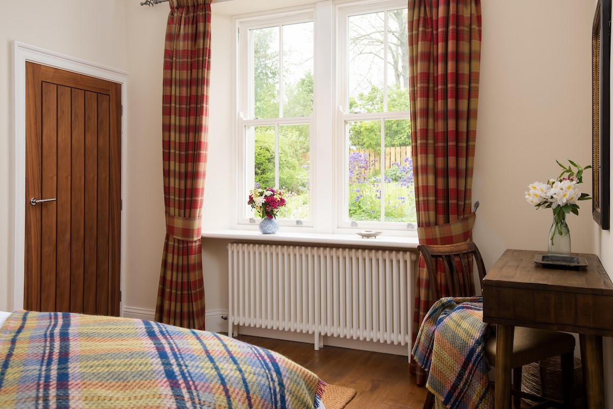 Pentland Cottage - the view over the garden from the bedroom