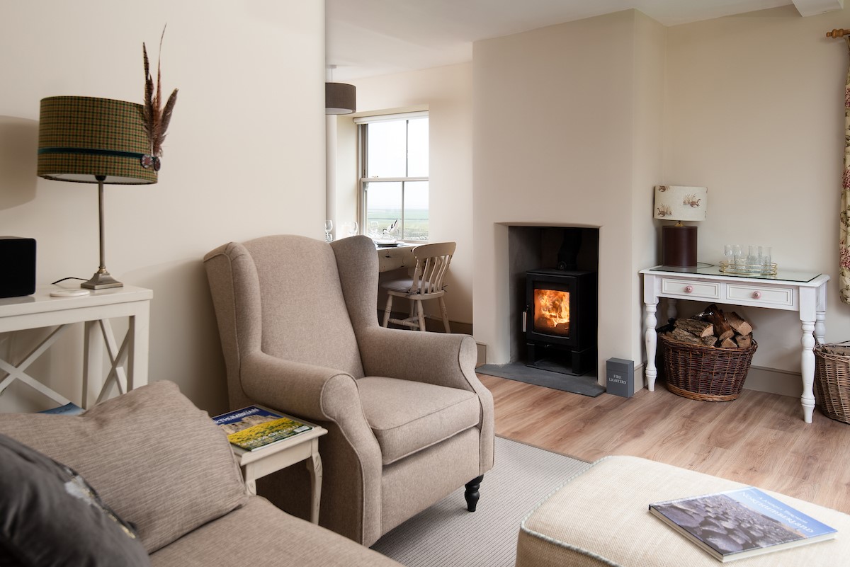 Bee Cottage - sitting room with cosy wood burner