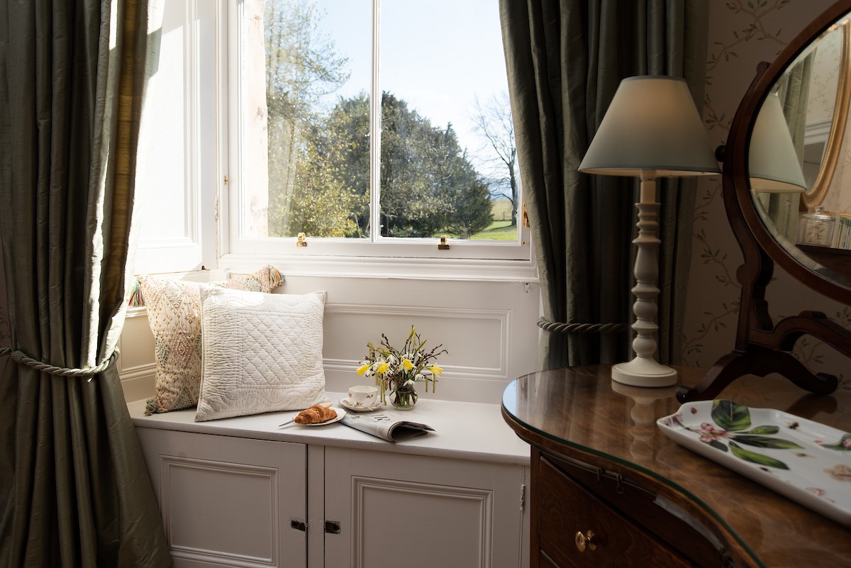 The Tower, Keith Marischal - charming window seat in bedroom one, perfect for admiring the property's lush setting