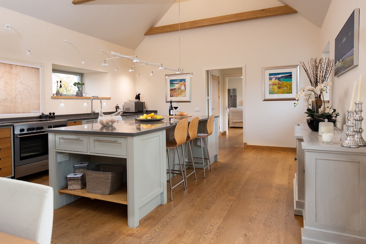 The Stables, Saltcoats Steading - spacious kitchen with kitchen island and breakfast bar and seating