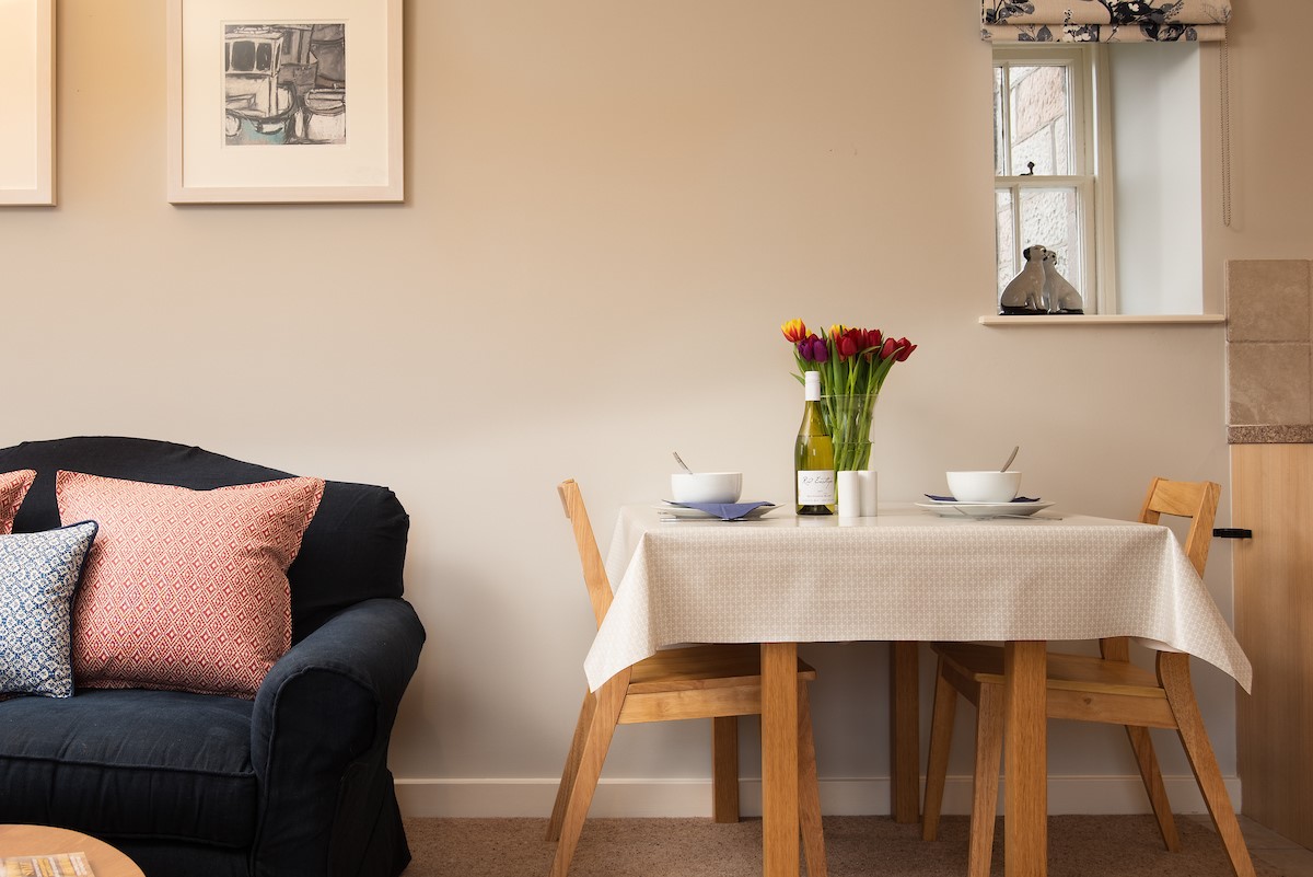 The Bothy at Cheswick - dining space in the open-plan living area, perfect for two