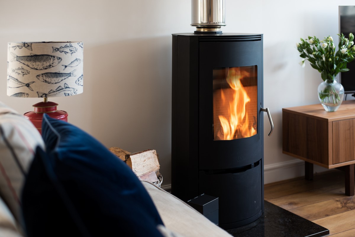No. 6 - relax in front of the large and cosy modern log burner in the sitting room