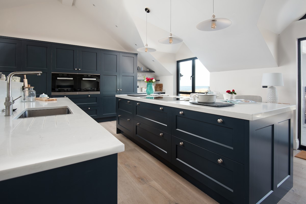 Seaside House - large well-equipped kitchen with double oven, induction hob and large 'coffee bar' cupboard