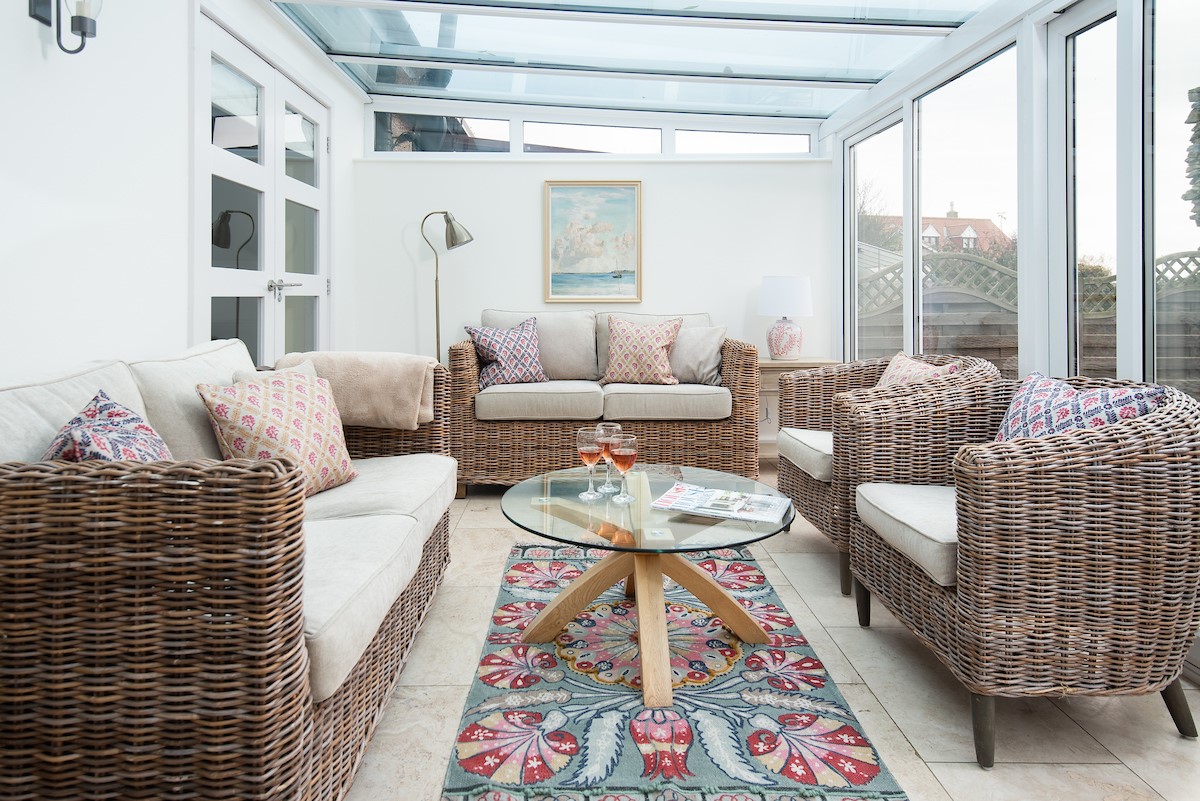 Friars Farm Cottage - ample seating in the large conservatory