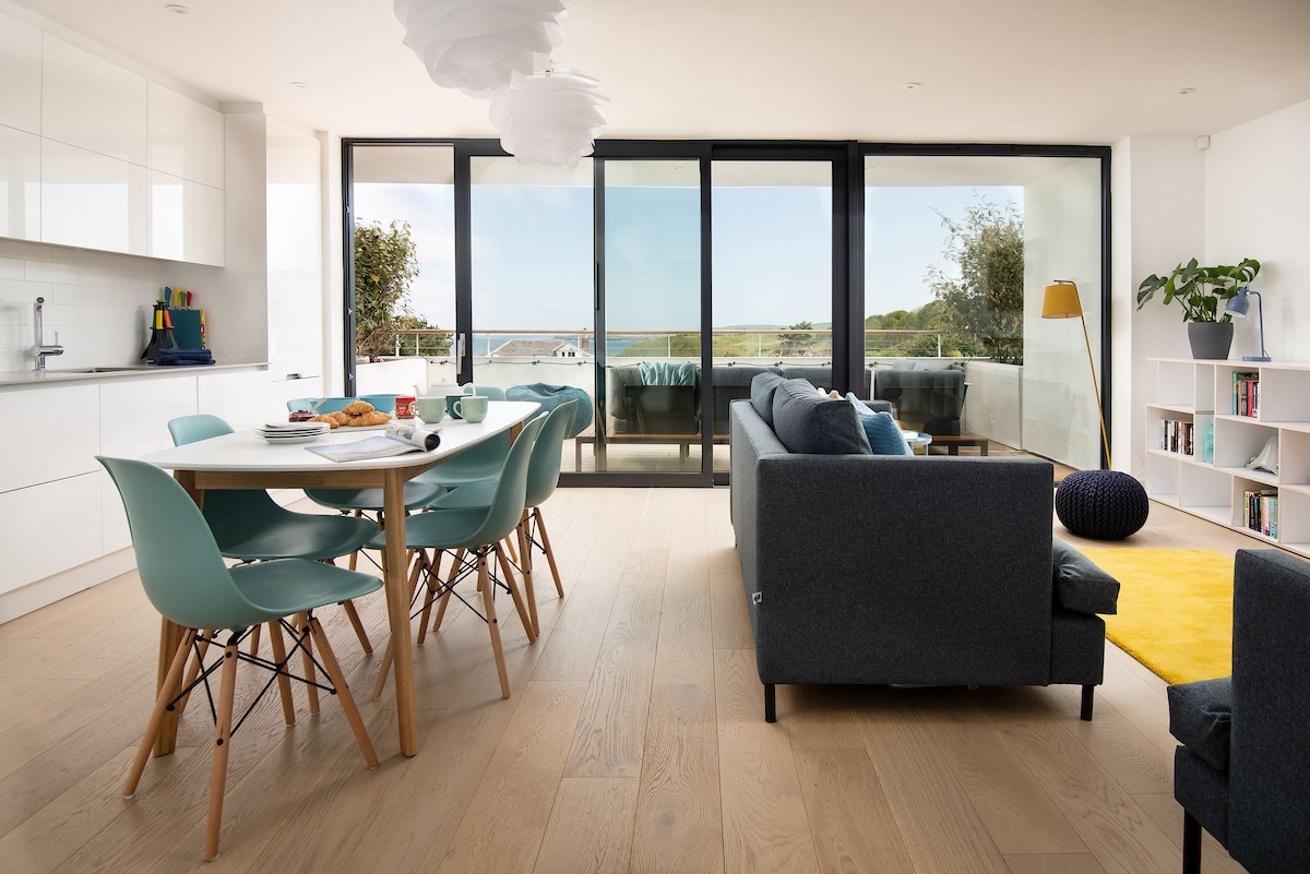 2 The Bay, Coldingham - the light-filled living space continues the coastal theme indoors with its distinct surf vibe