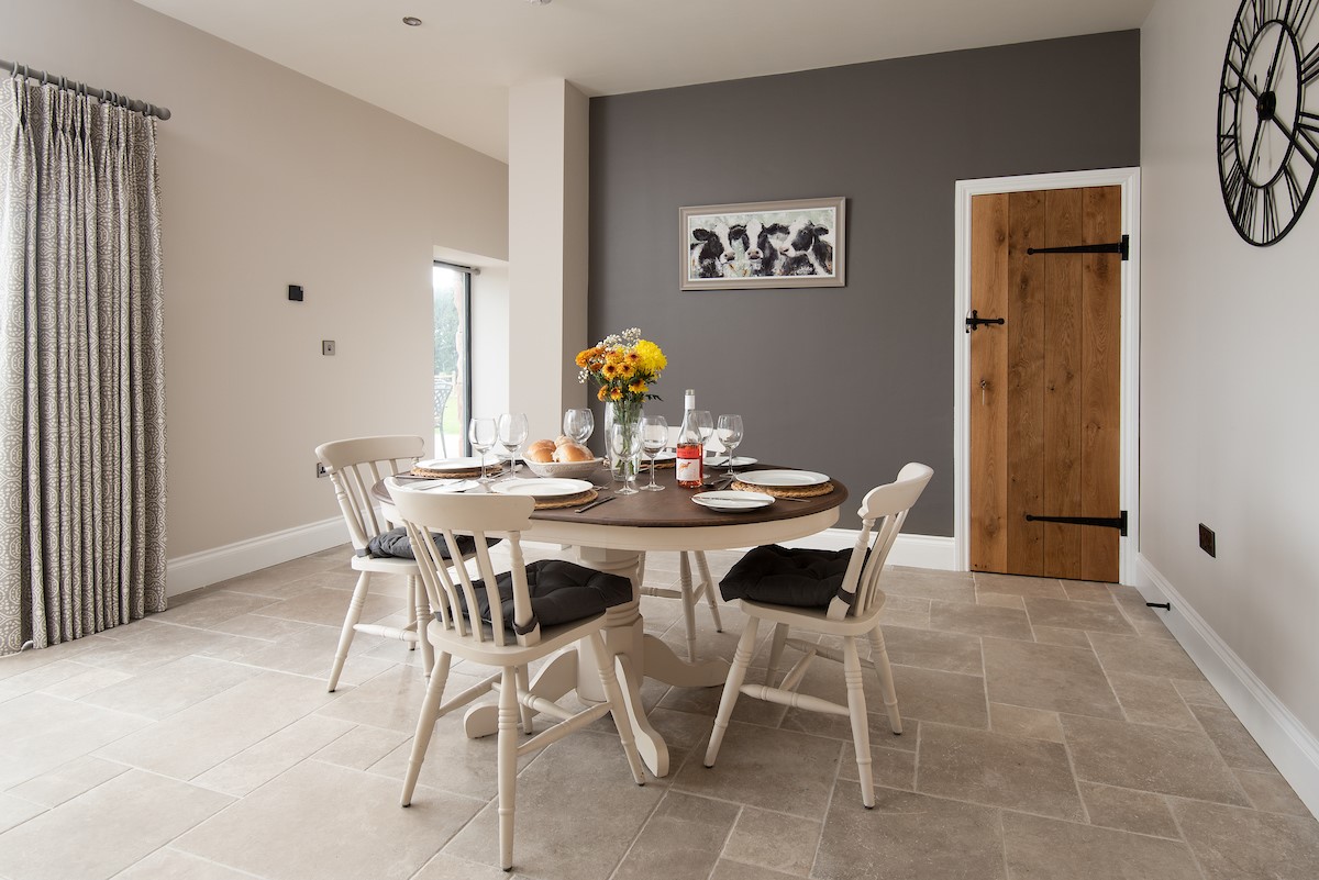 Mill Cottage, Brockmill Farm - round dining table with seating for 4 guests