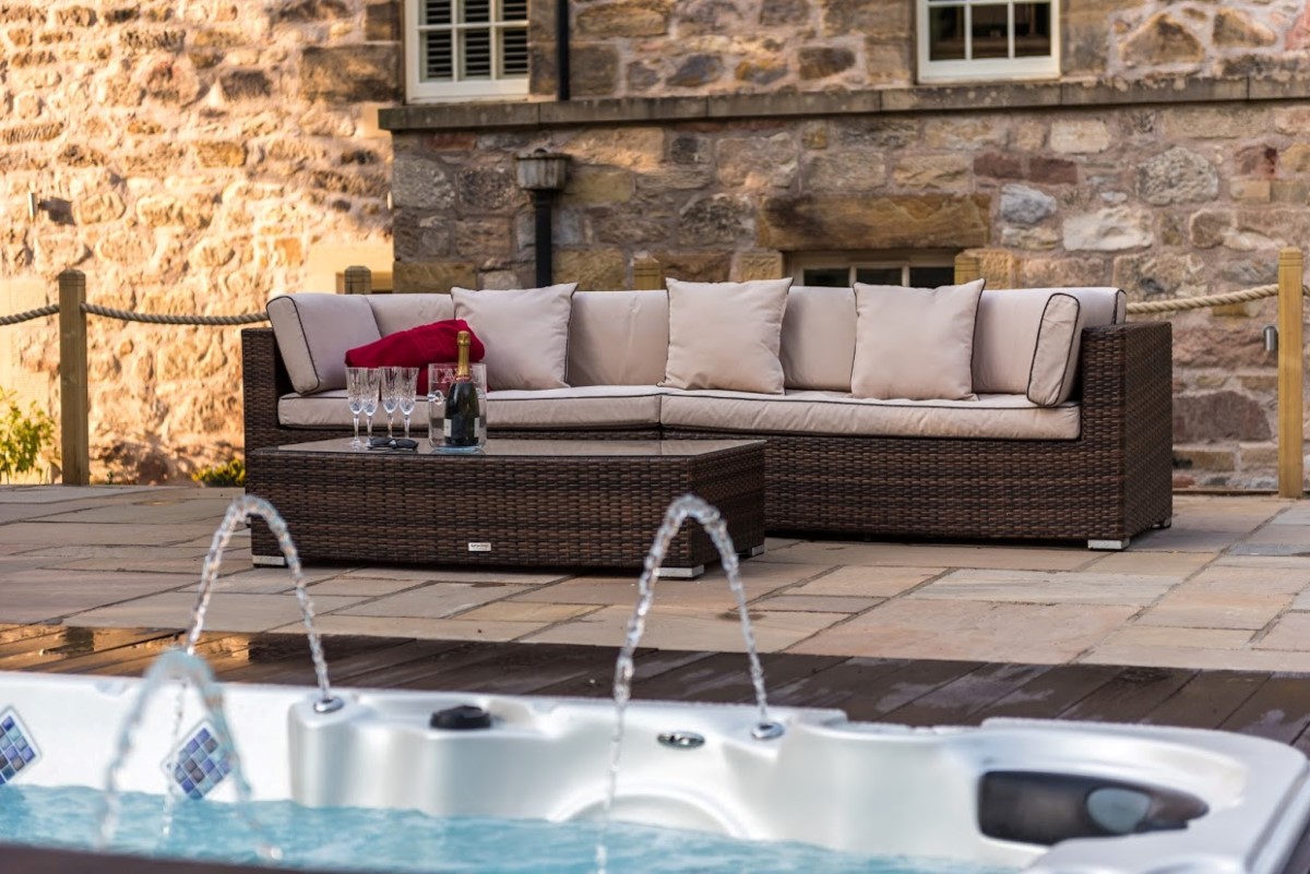 The Old Millhouse - enjoy a comfortable seat and a glass of fizz before a dip in the swim spa