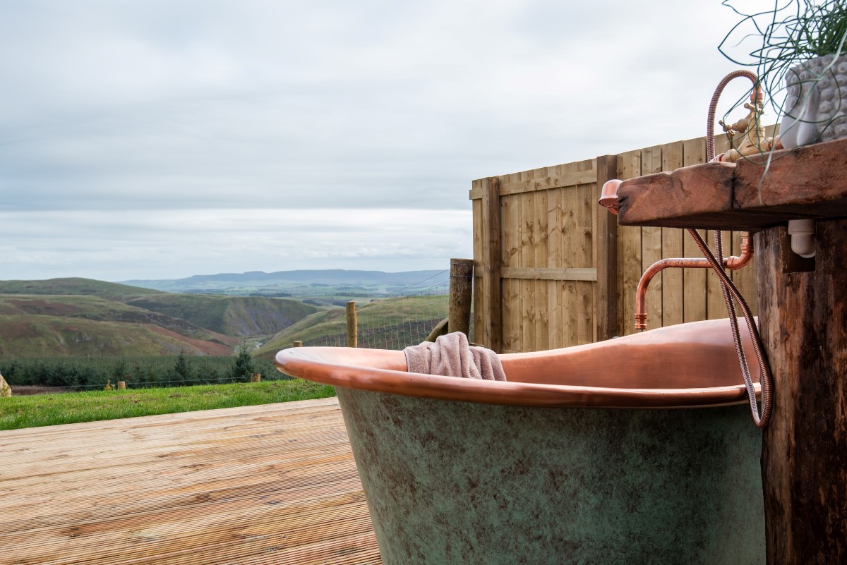 The Willow - relax and enjoy views of the valley whilst taking a soak in the copper Shaanti bath