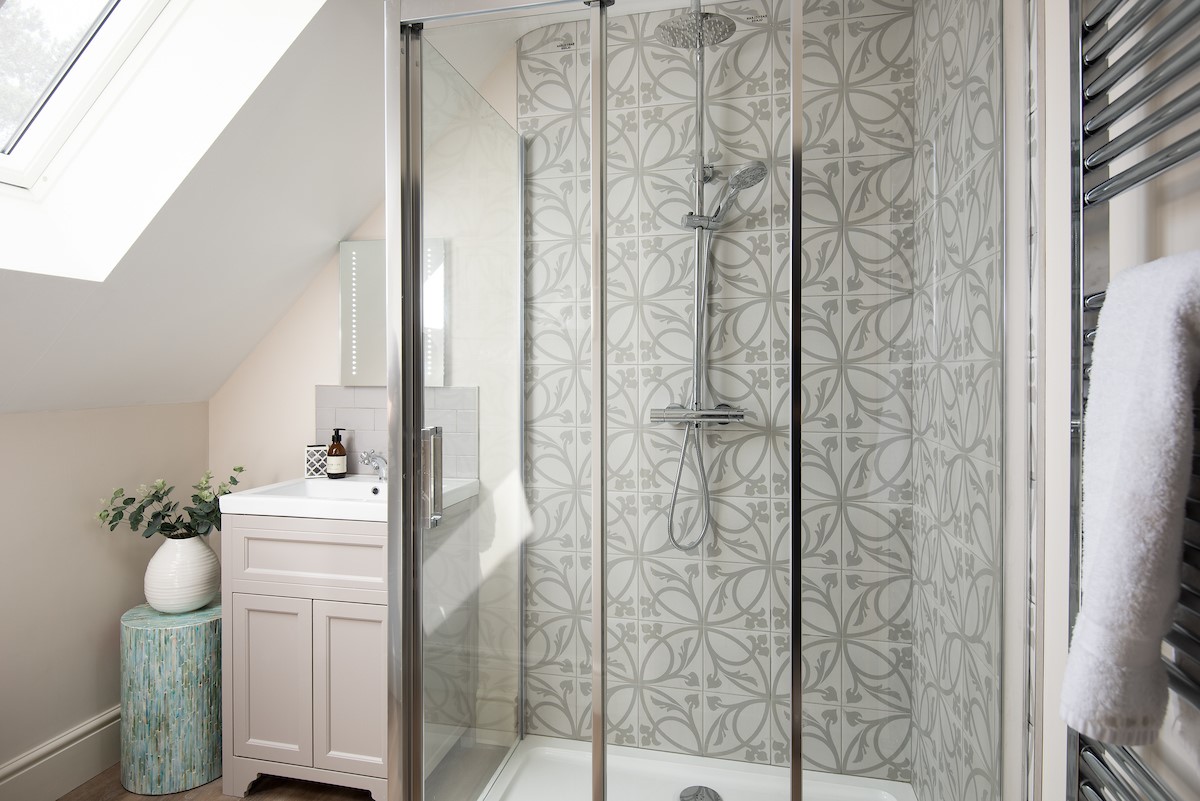 Partridge Lodge - beautifully tiled en-suite master bathroom; large shower with rainforest head and separate mixer