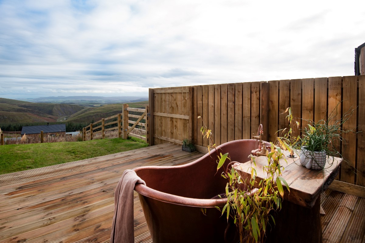 The Maple - relax and enjoy views of the valley whilst taking a soak in the outdoor copper Shaanti bath