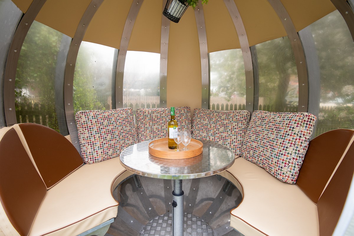 Nook - pretty garden pod which is an ideal space for enjoying meals in the garden or relaxing with a book