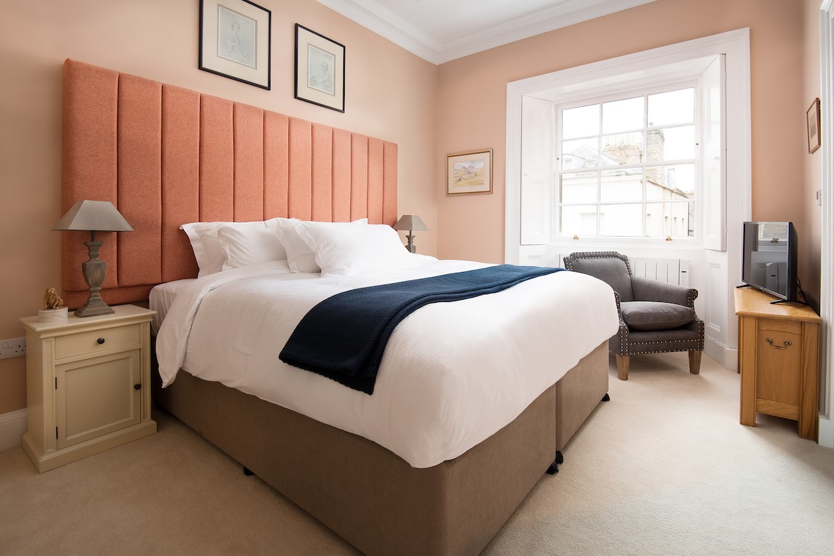 The Linen House - bedroom three with zip and link beds, which can be configured as a super king double or twin, as preferred