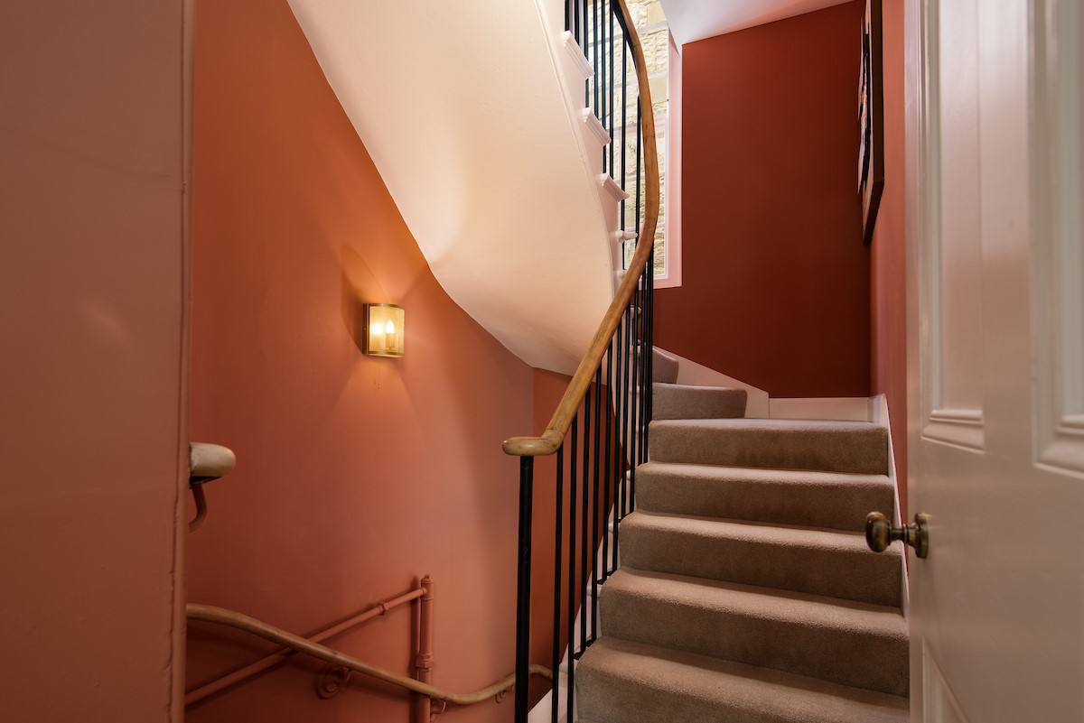 The Scott Apartment - internal access staircase to the rear leading to the fifth bedroom