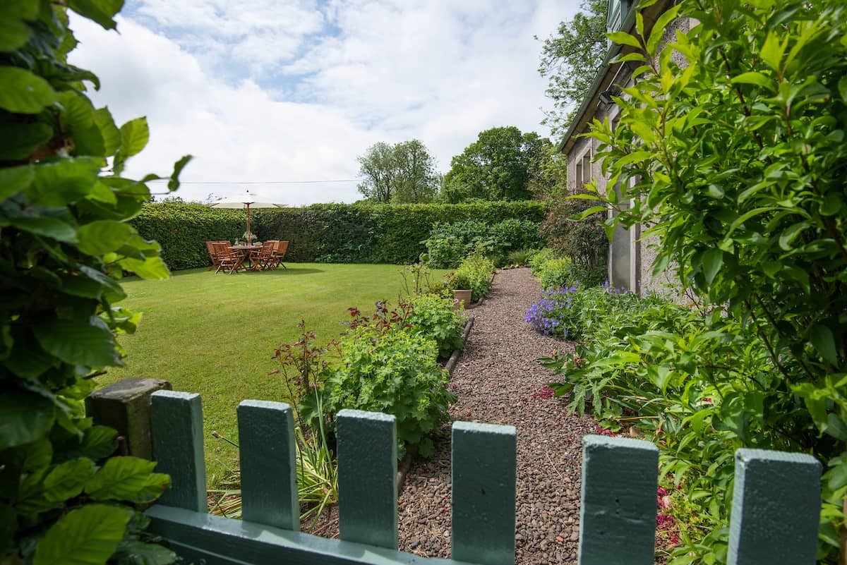 Lane Cottage - the charming, mature garden is fully enclosed