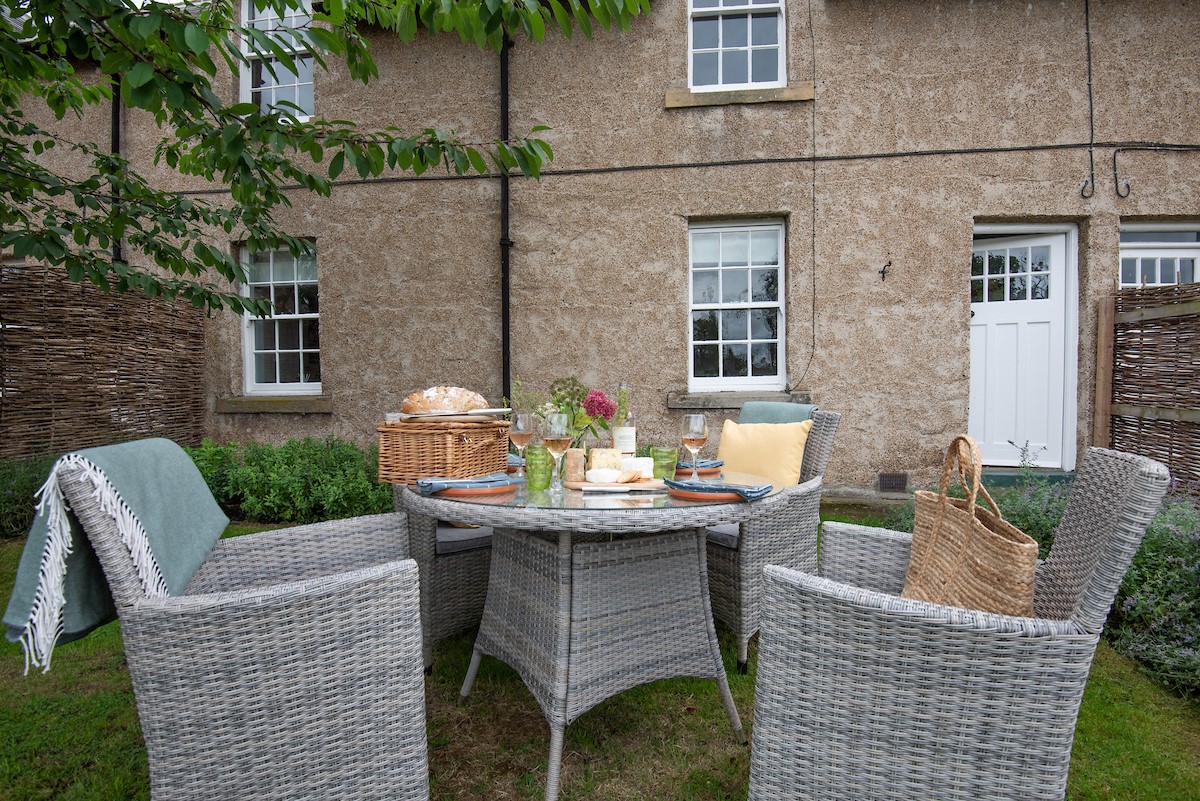 Cuthbert House - rear garden with outdoor dining