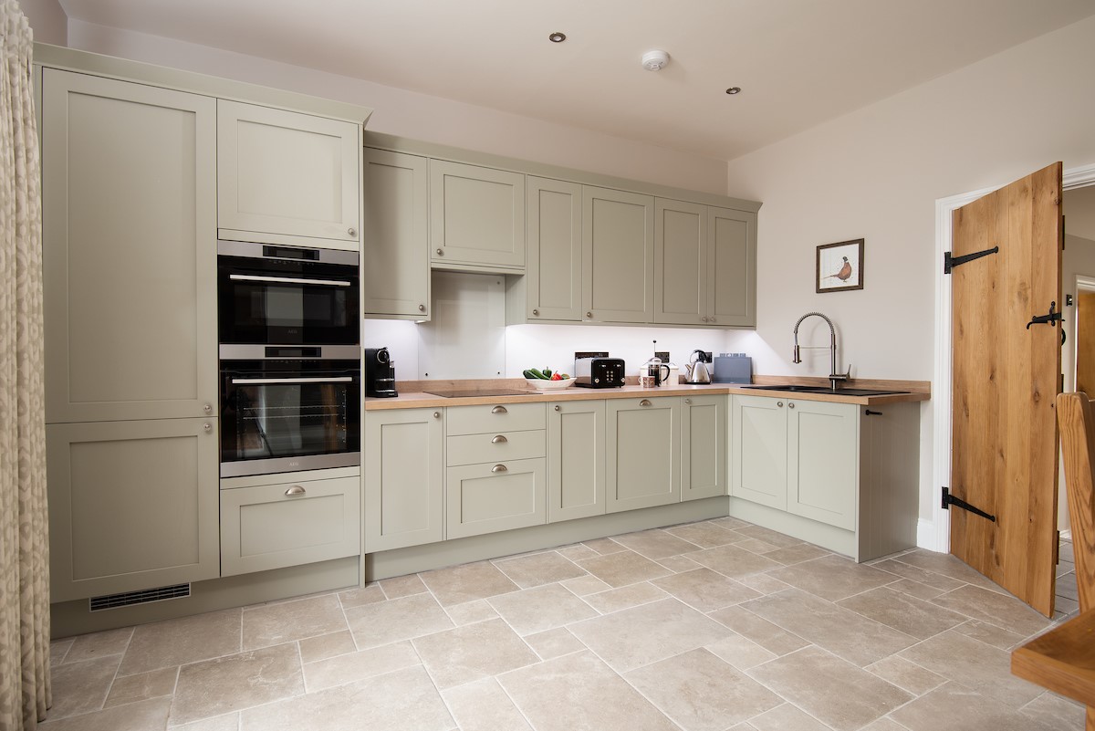 Granary View, Brockmill Farm - spacious kitchen with integrated fan oven/grill, combi microwave oven, electric hob, coffee machine, dishwasher and fridge/freezer