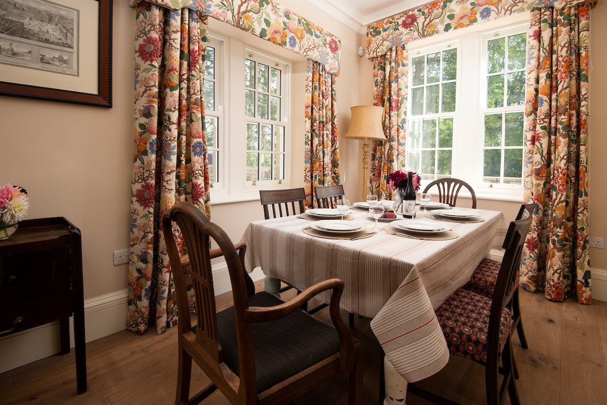 Birks Stable Cottage - dining room with table seating up to six guests