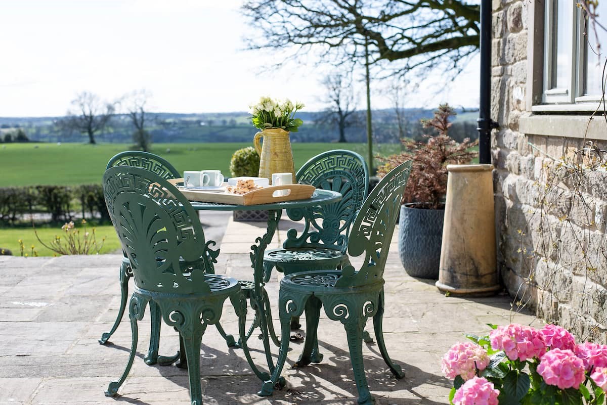 Anvil Cottage - the sunny patio with garden furniture