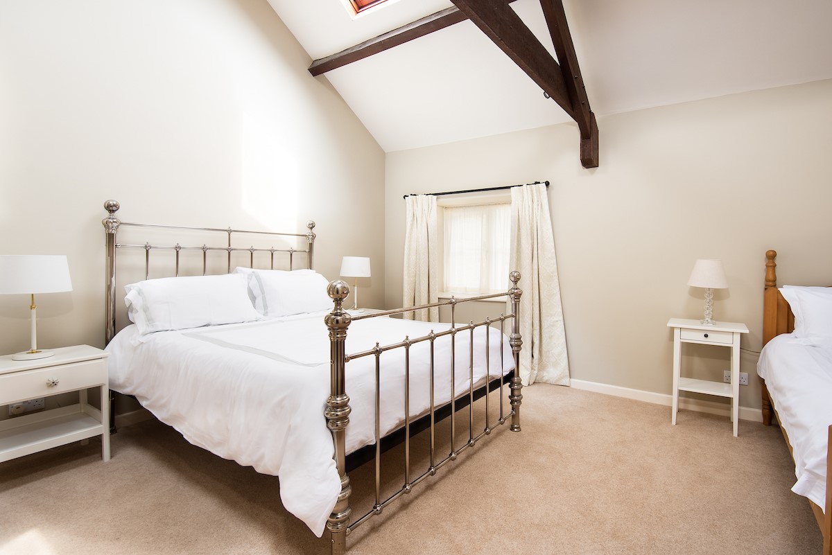 Grey Barns - bedroom seven with a double bed and a single bed