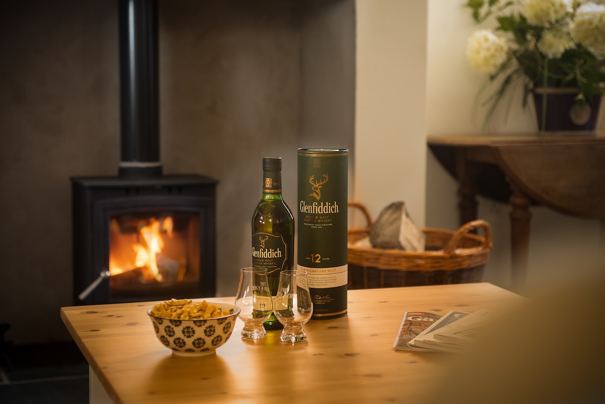 Lookout South - enjoy an evening dram in front of the wood burning stove