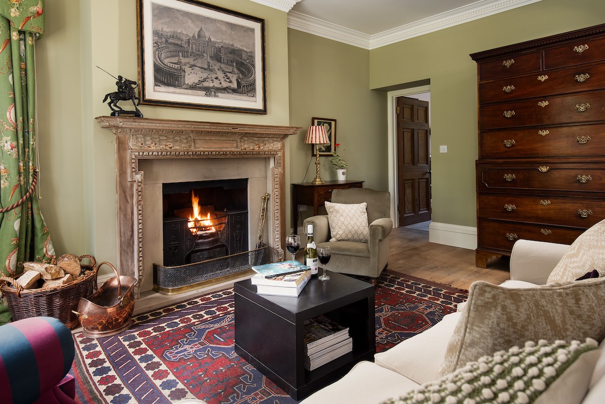 Birks Stable Cottage - cosy sitting room with open fire