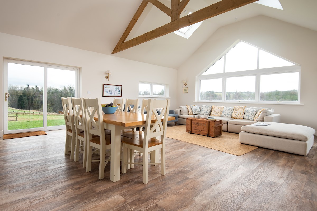 Riverhill Cottage - enjoy meals around the dining table with the countryside views as a backdrop
