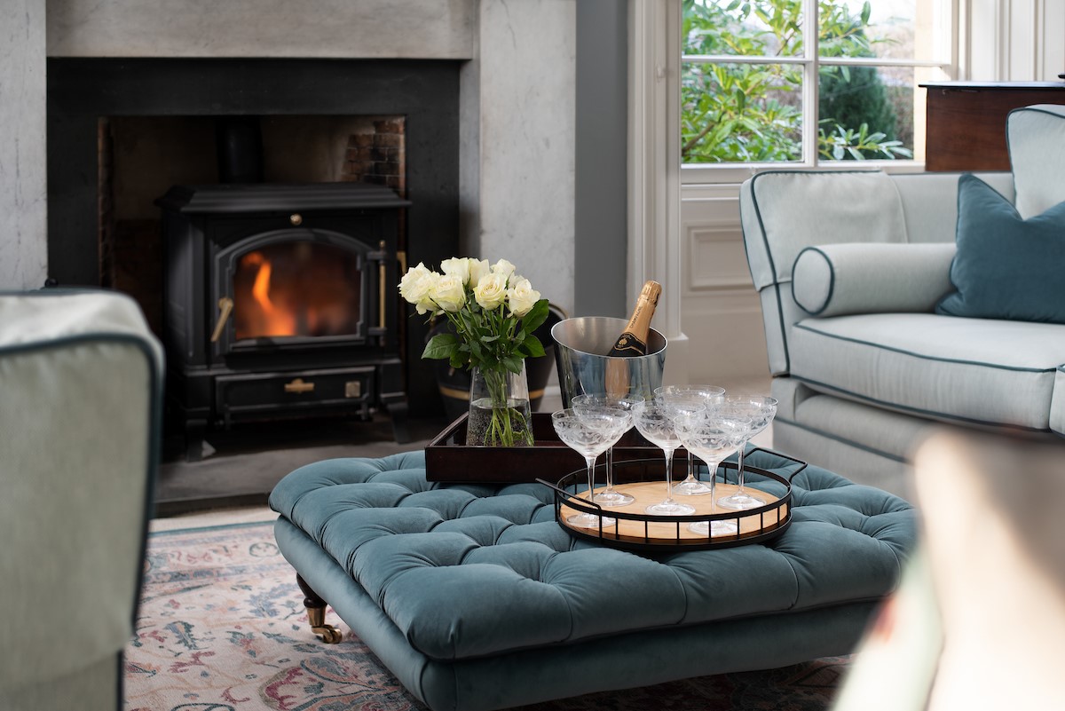 Cairnbank House - unwind with friends and family in the drawing room complete with wood burner