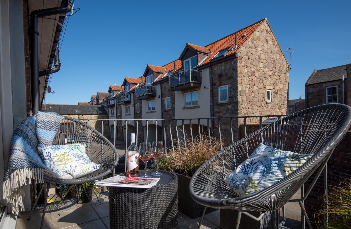 Farne View - small balcony with seating for two - perfect for a drink in the sun