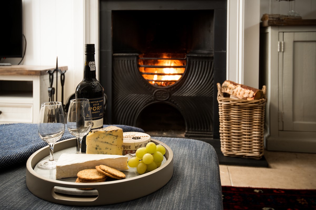 The Arch - unwind with a glass of wine in front of the cosy open fire