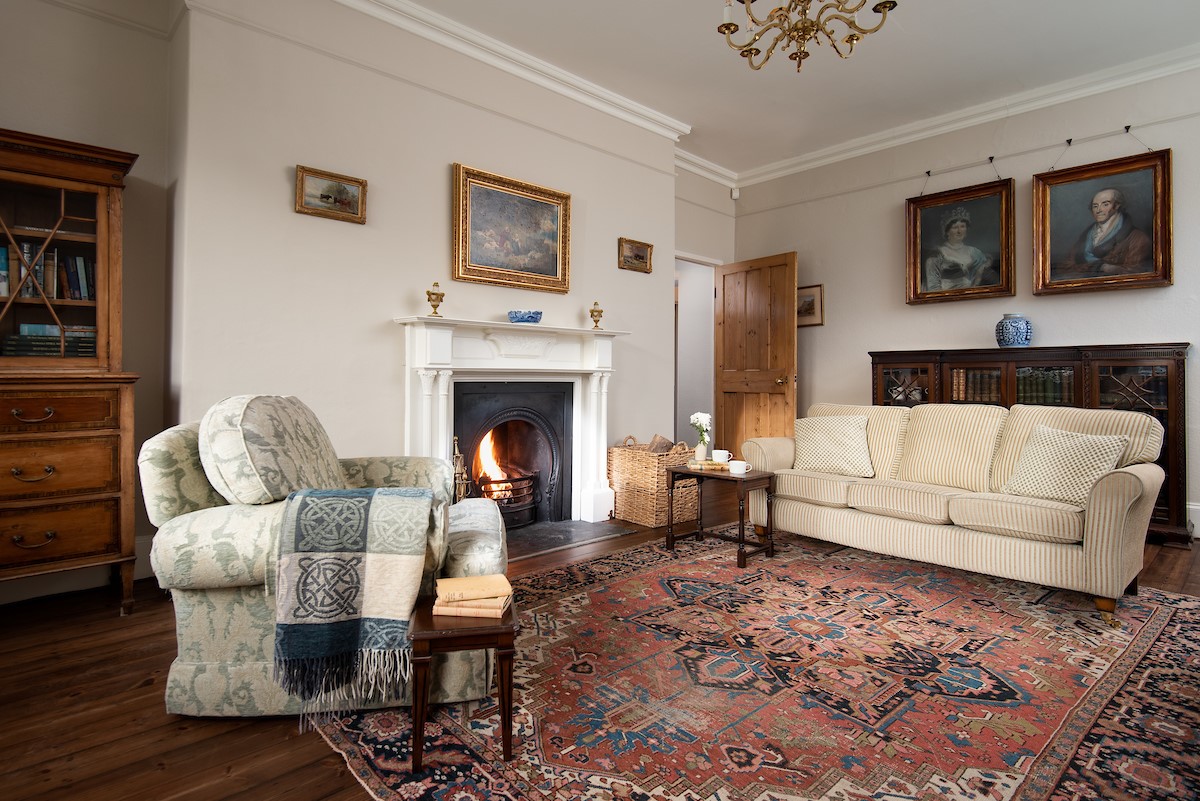 The Old Vicarage - large drawing room with two sofas, two armchairs and an open fire - guests should note that some cosmetic changes are being made to the drawing room - new photos to follow