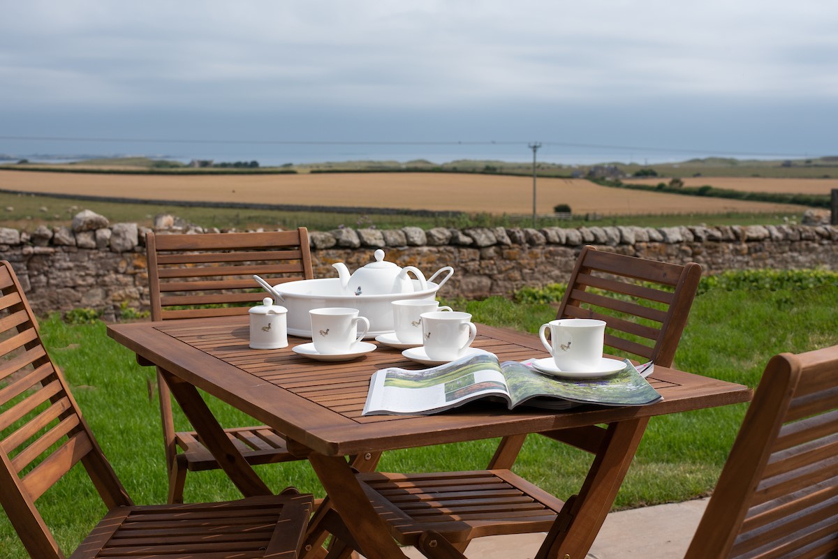Lyme Grass - the patio seating area looking to the sea