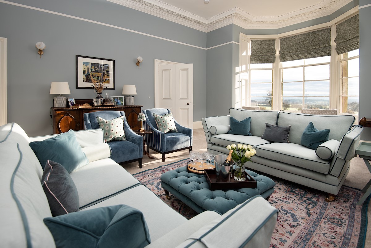 Cairnbank House - large windows creates a bright and relaxing space in the drawing room