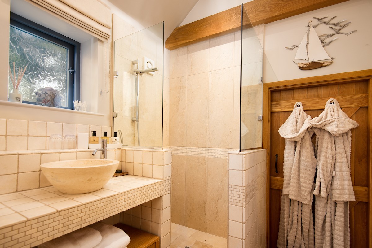 Bay View Cottage - the ground floor bathroom with large walk in shower