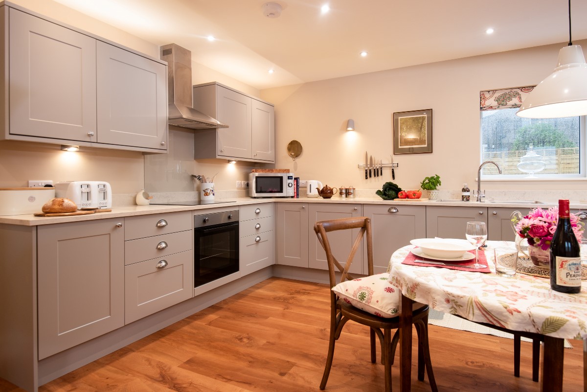 Garden Cottage - has a well equipped kitchen and dining area