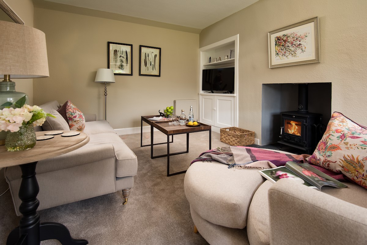 Laurel Cottage - sitting room with cosy wood burner