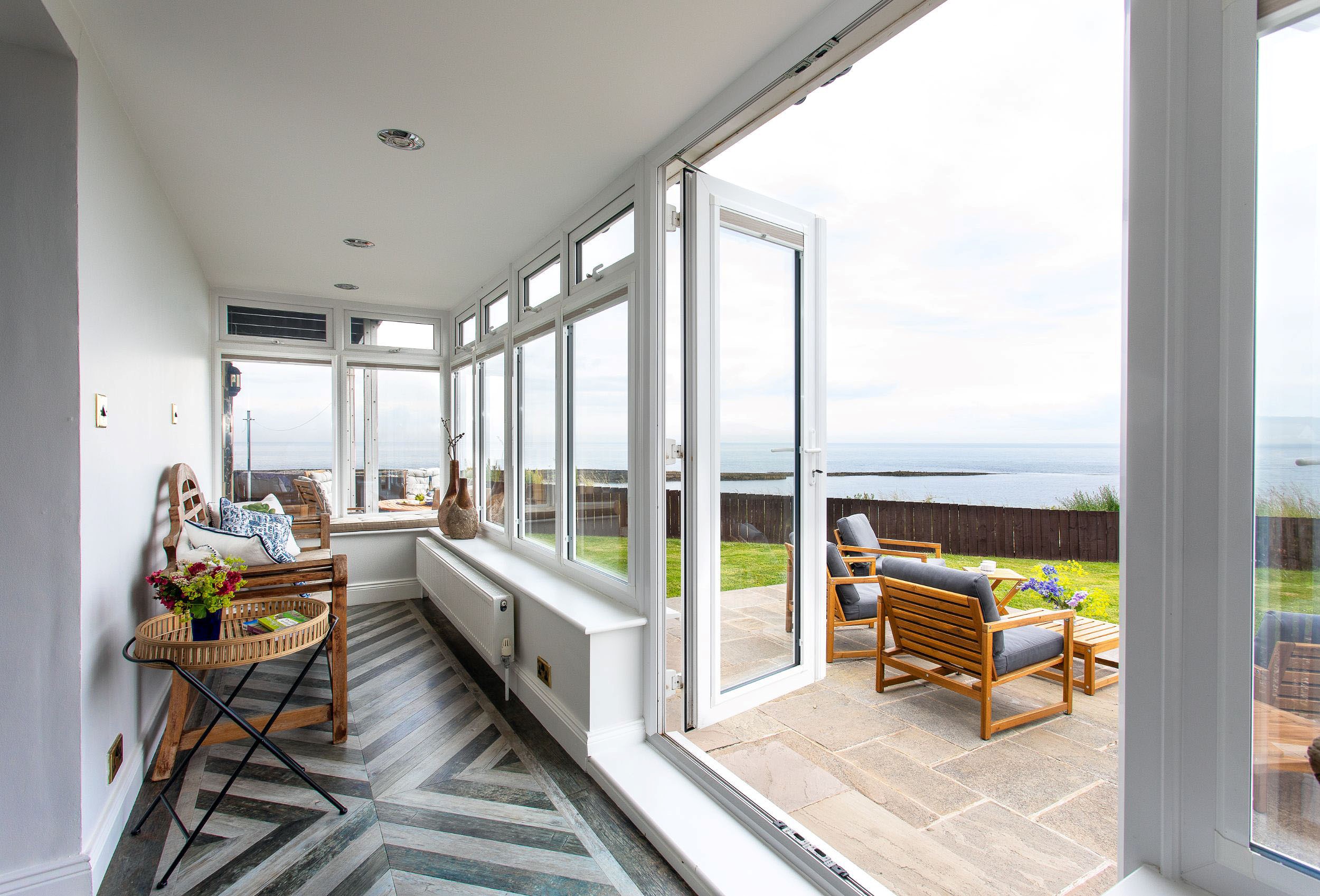 Sea Breeze - French doors from the sun room open out onto the patio