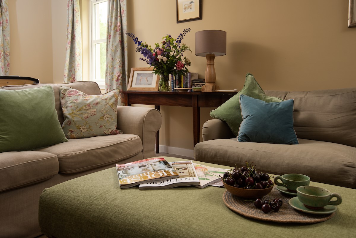 Pirnie Cottage - the sitting room with generous sofas