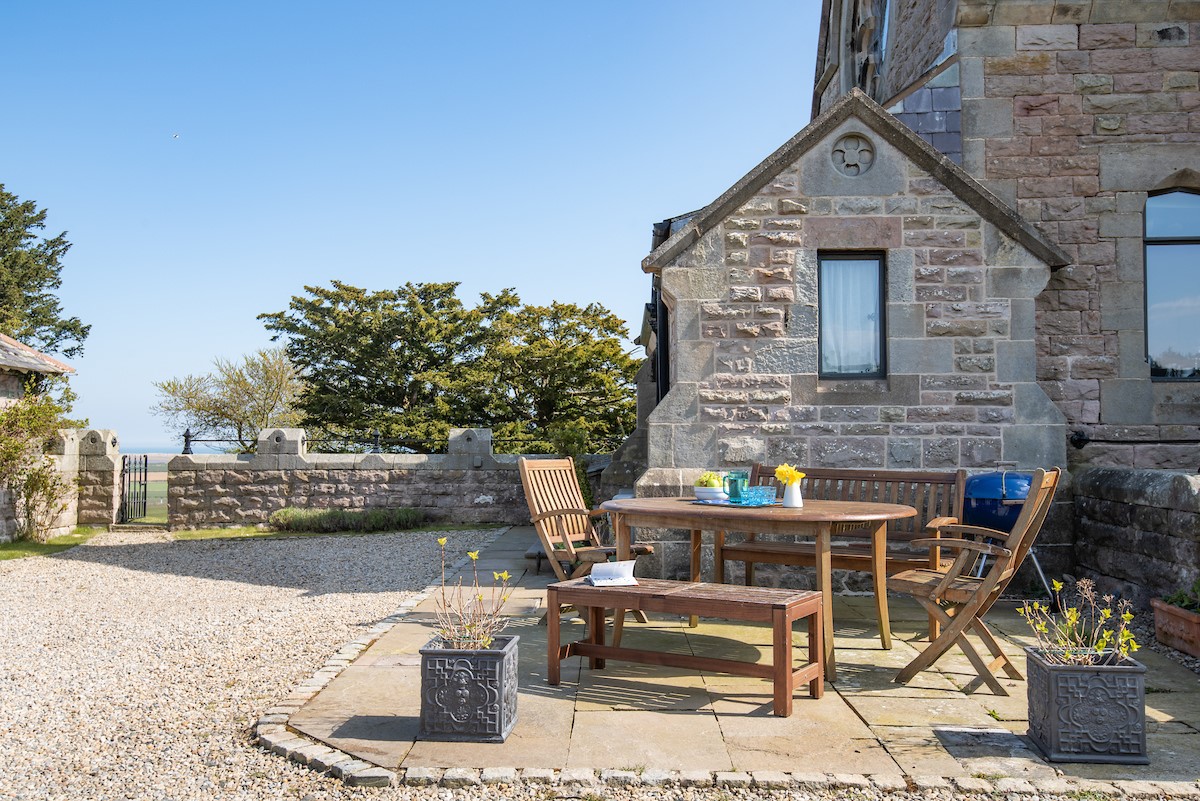 Lindisfarne View - the patio area to the rear with garden furniture
