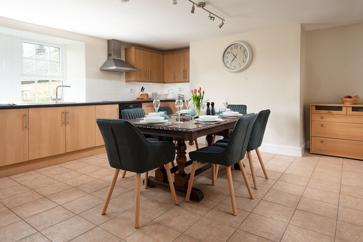 Grange House - large kitchen with dining table seating up to six guests
