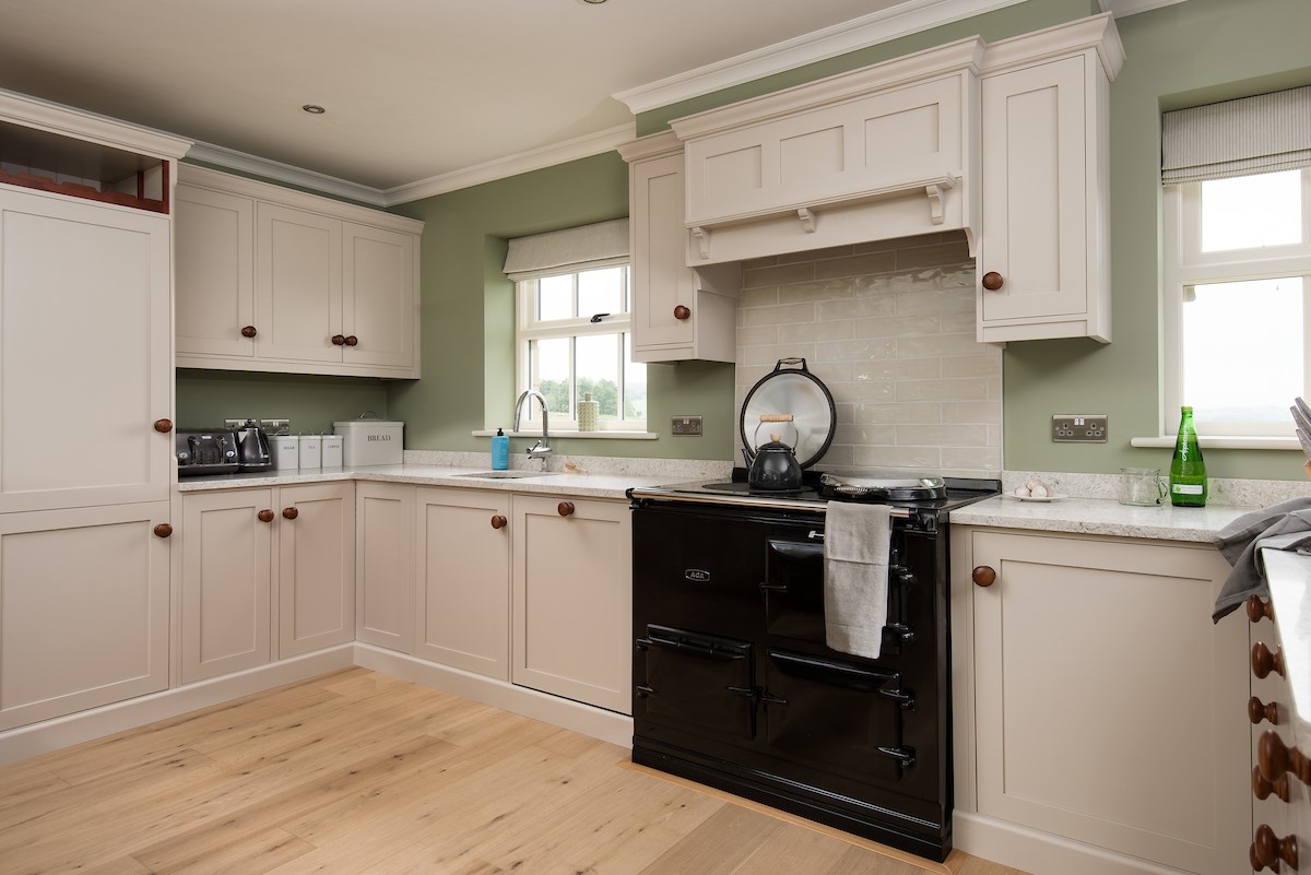 Risingham House - well-equipped kitchen with AGA