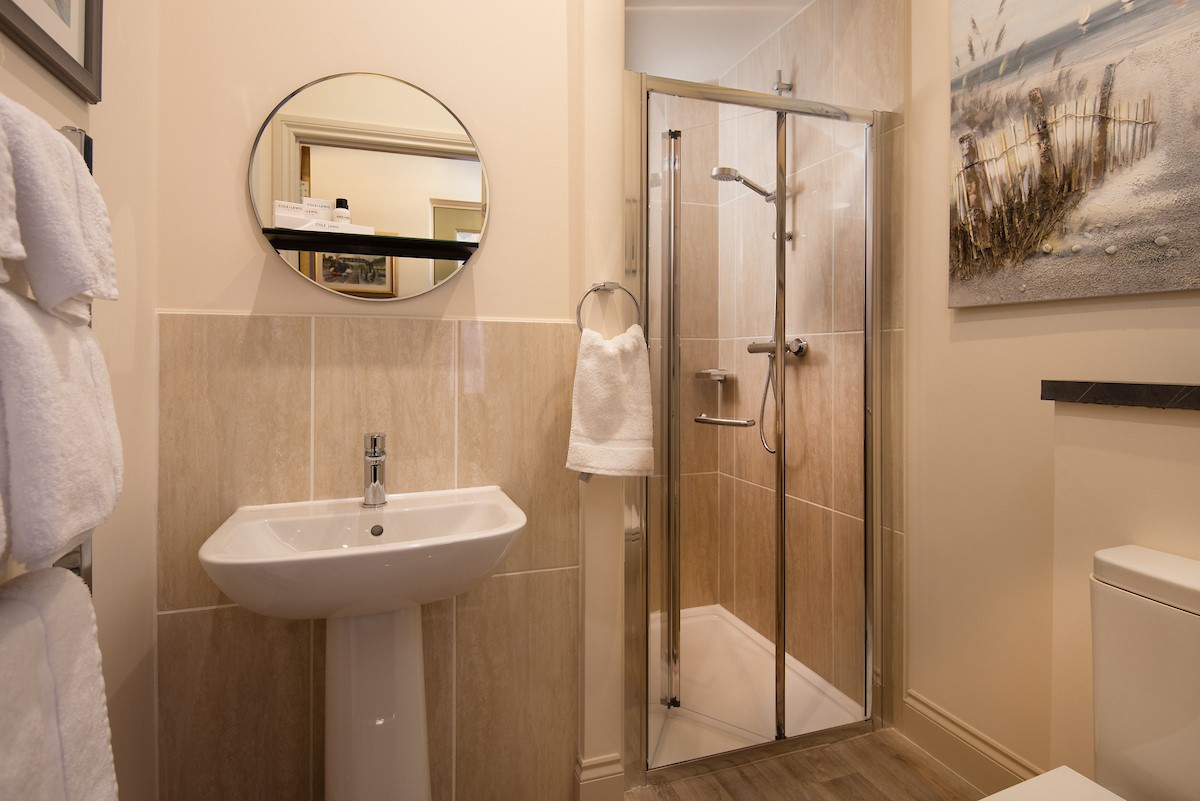 Bank View - walk-in shower in bathroom one with heated towel rail